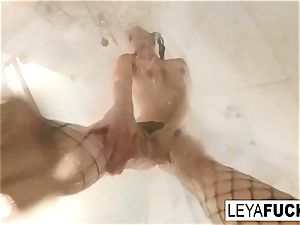 Leya Falcon takes a camera with her into the douche